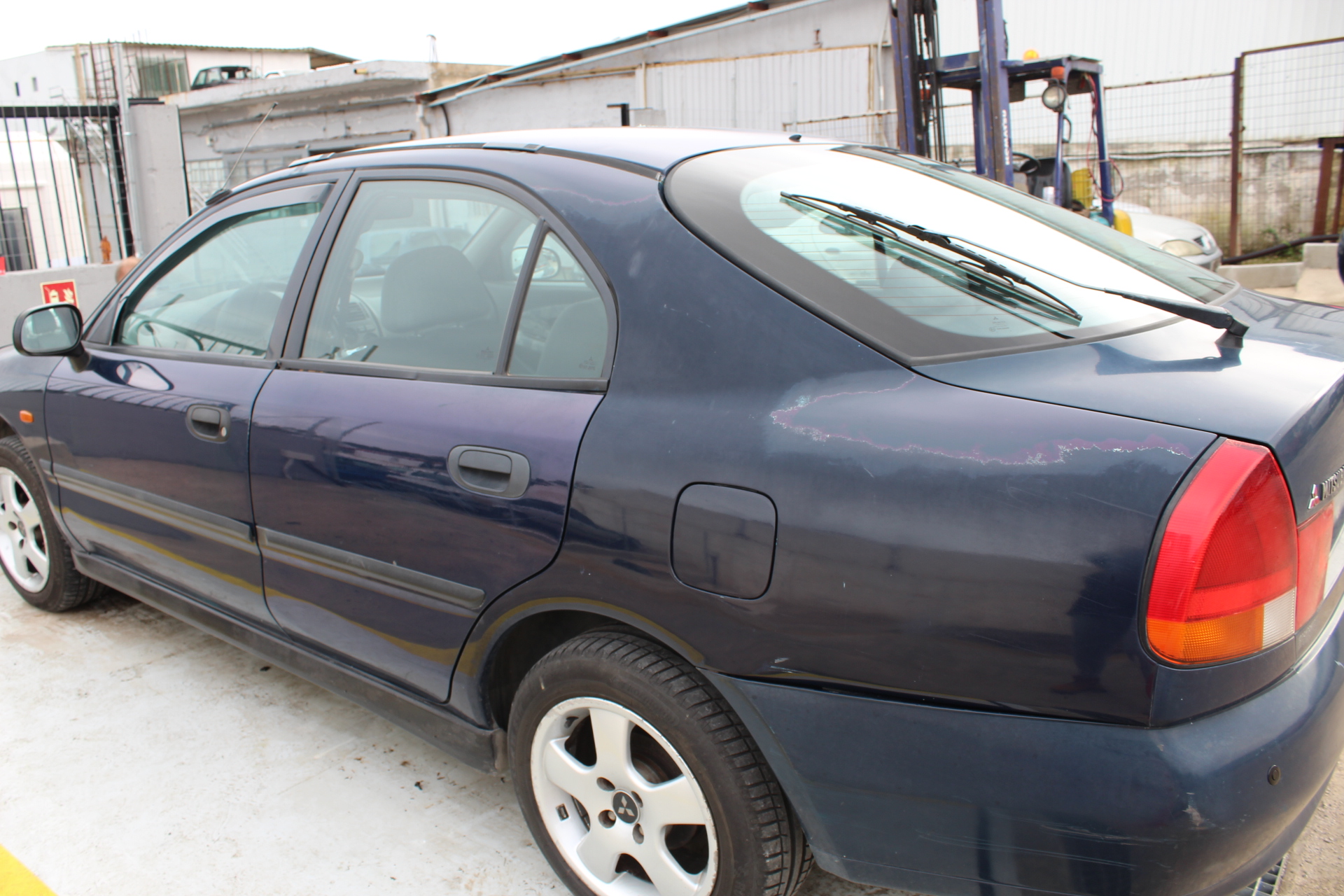 Πορτάκι Ρεζερβουάρ Mitsubishi Carisma ’98 Προσφορά