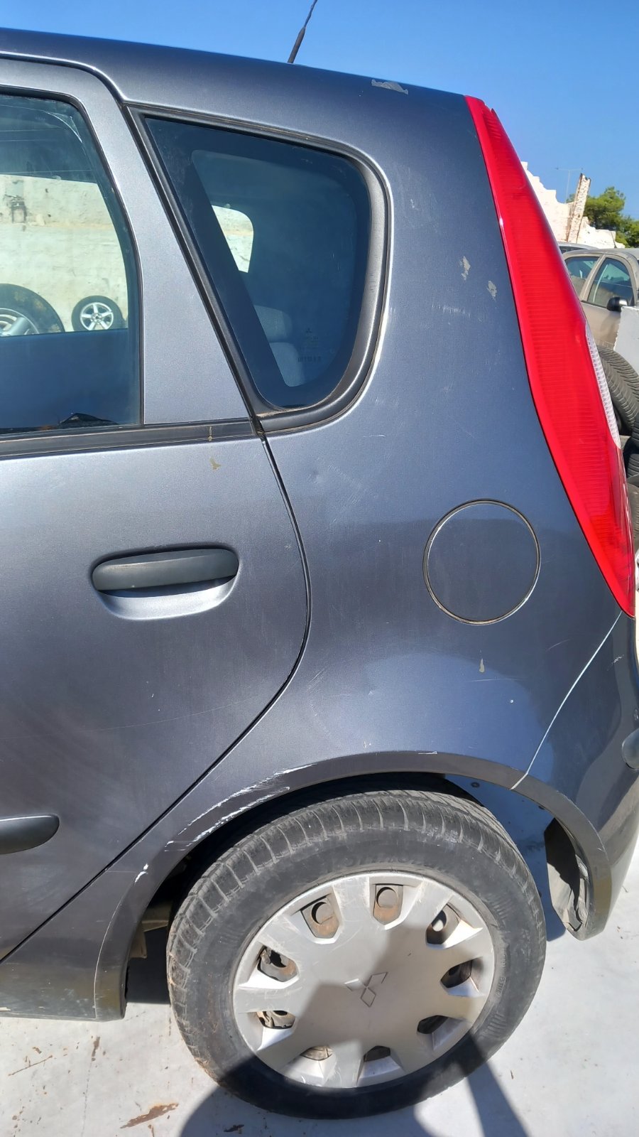 Πορτάκι Ρεζερβουάρ Mitsubishi Colt ’08 Προσφορά